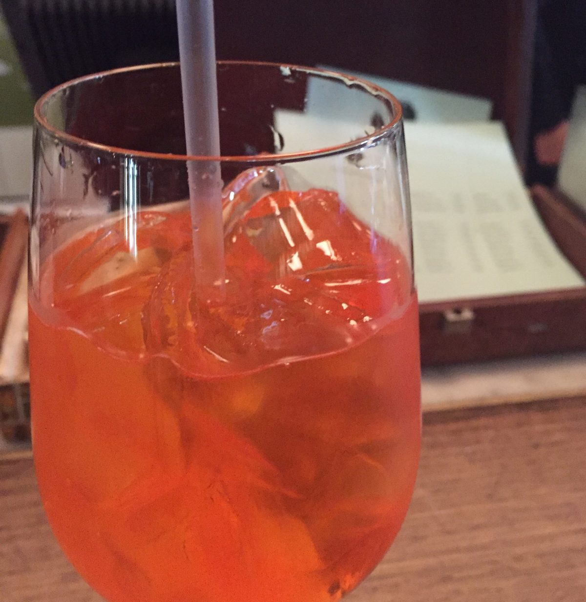 An orange cocktail drink