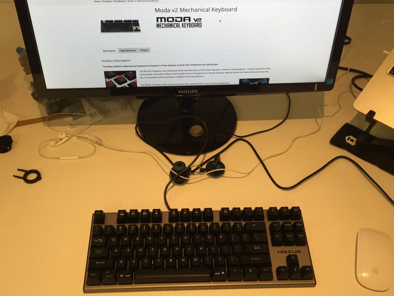 A mechanical keyboard sitting on a desk