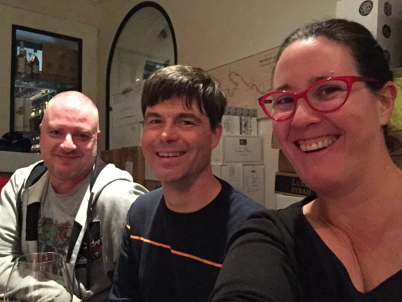 Three people sitting in a restaurant