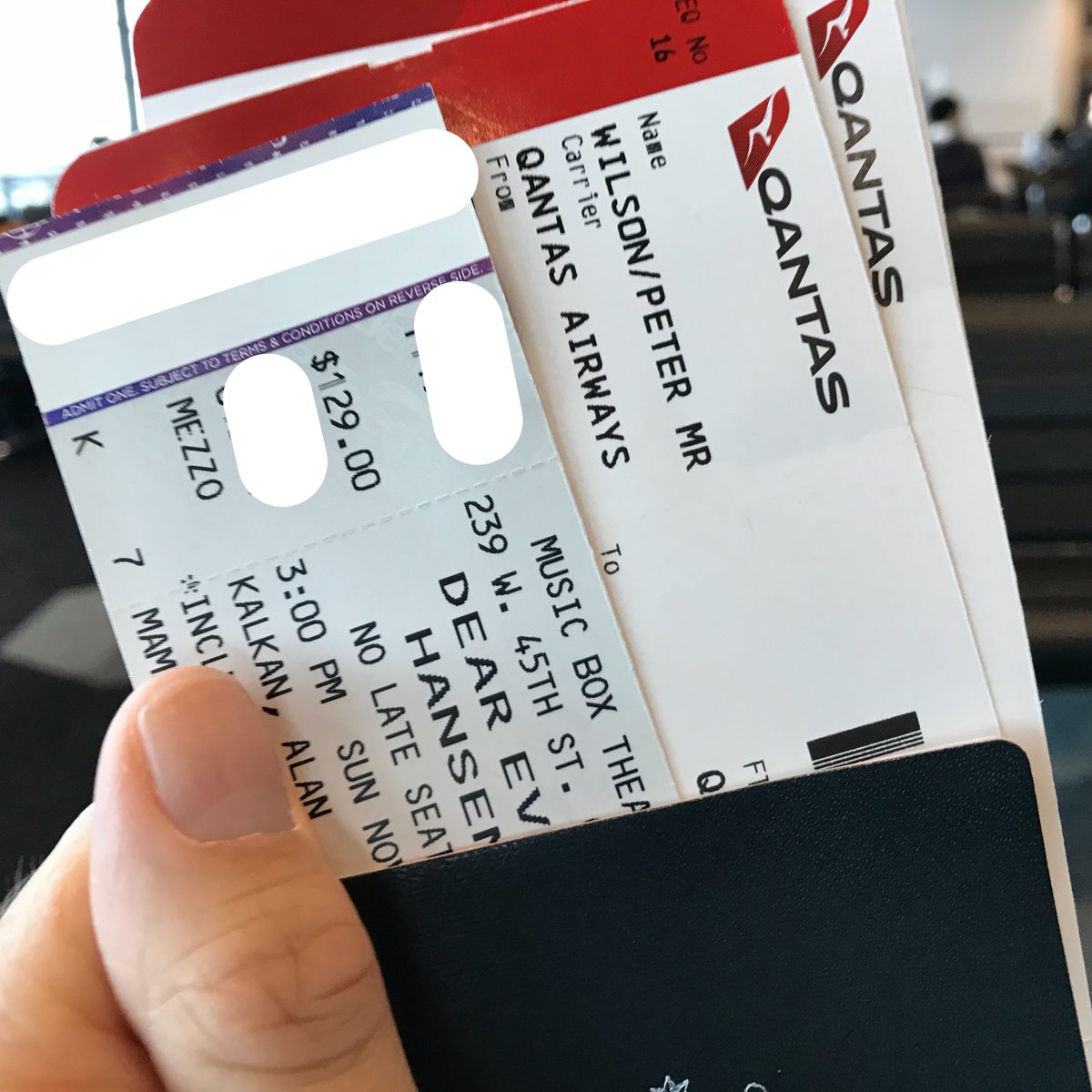 Passport, airline tickets and theatre tickets