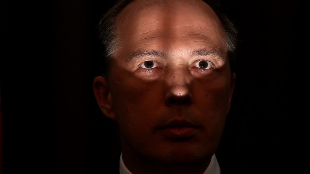 Semilite and uncomplimentary photo of Peter Dutton.