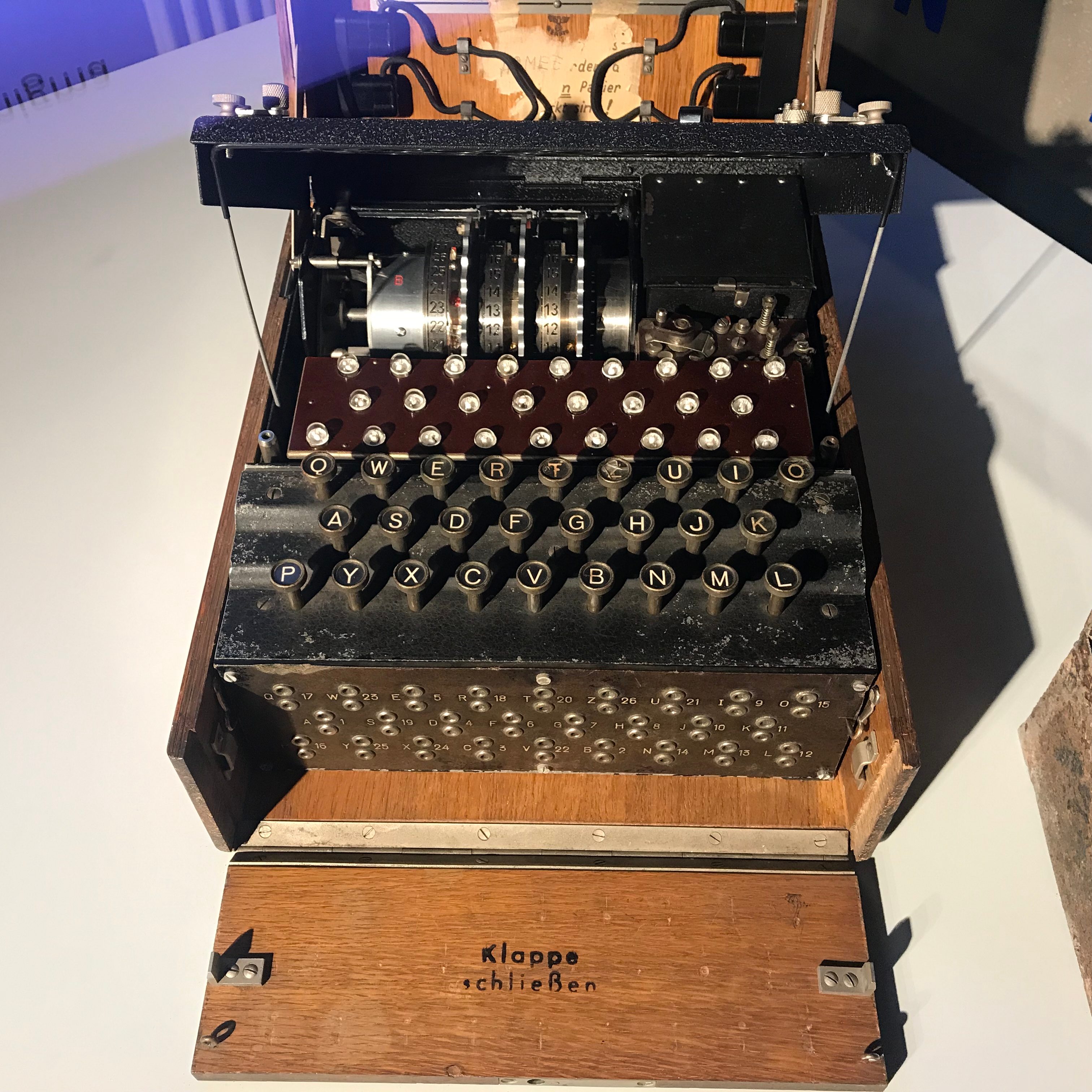 An enigma machine in a wooden box