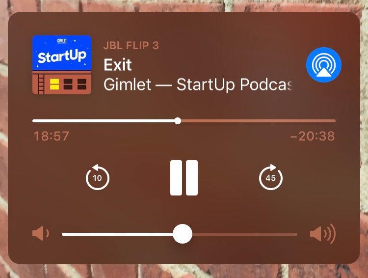 Screen shot of Apple Podcast play screen with buttons to skip forward and backward by 45 seconds
