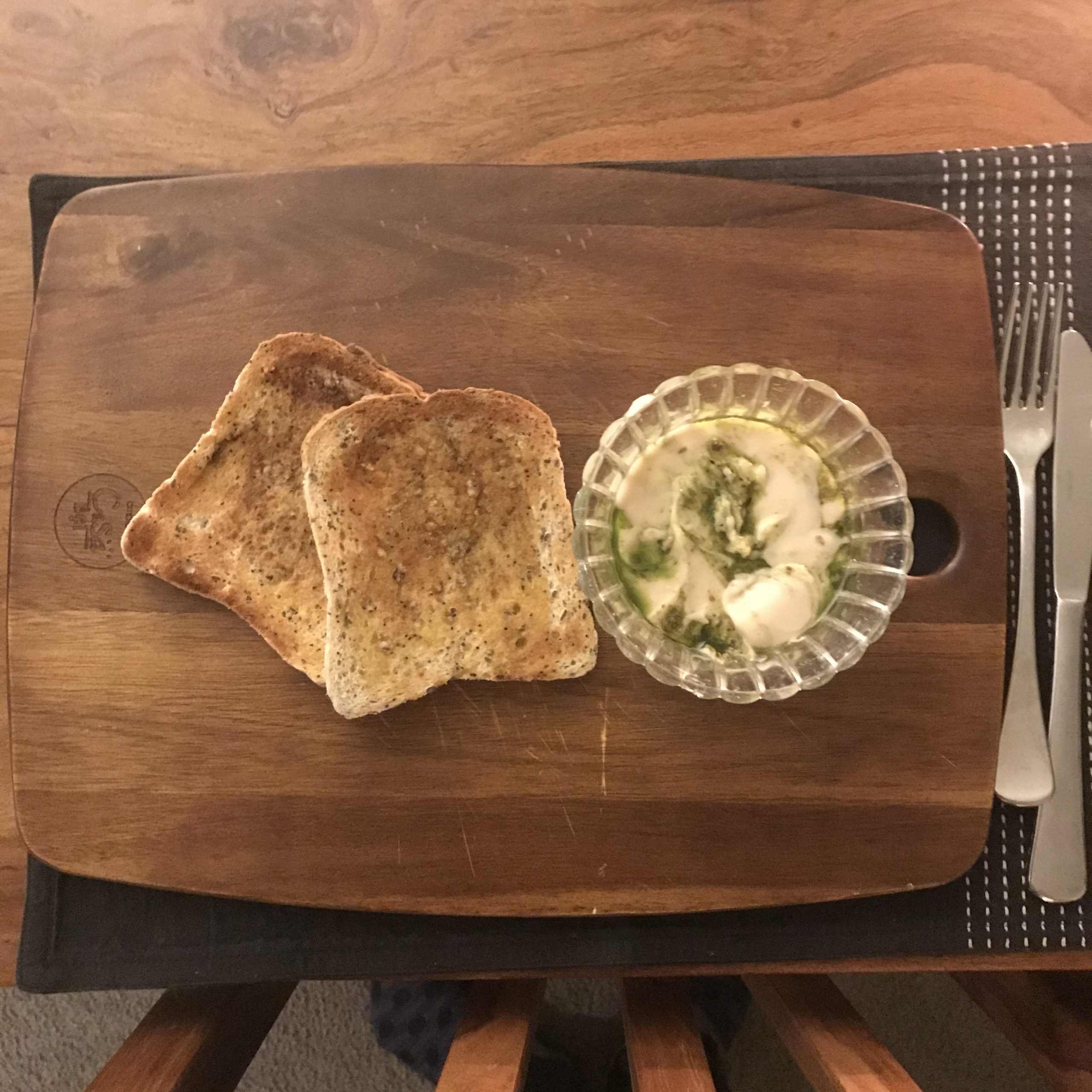 Toast and dip on a chopping board