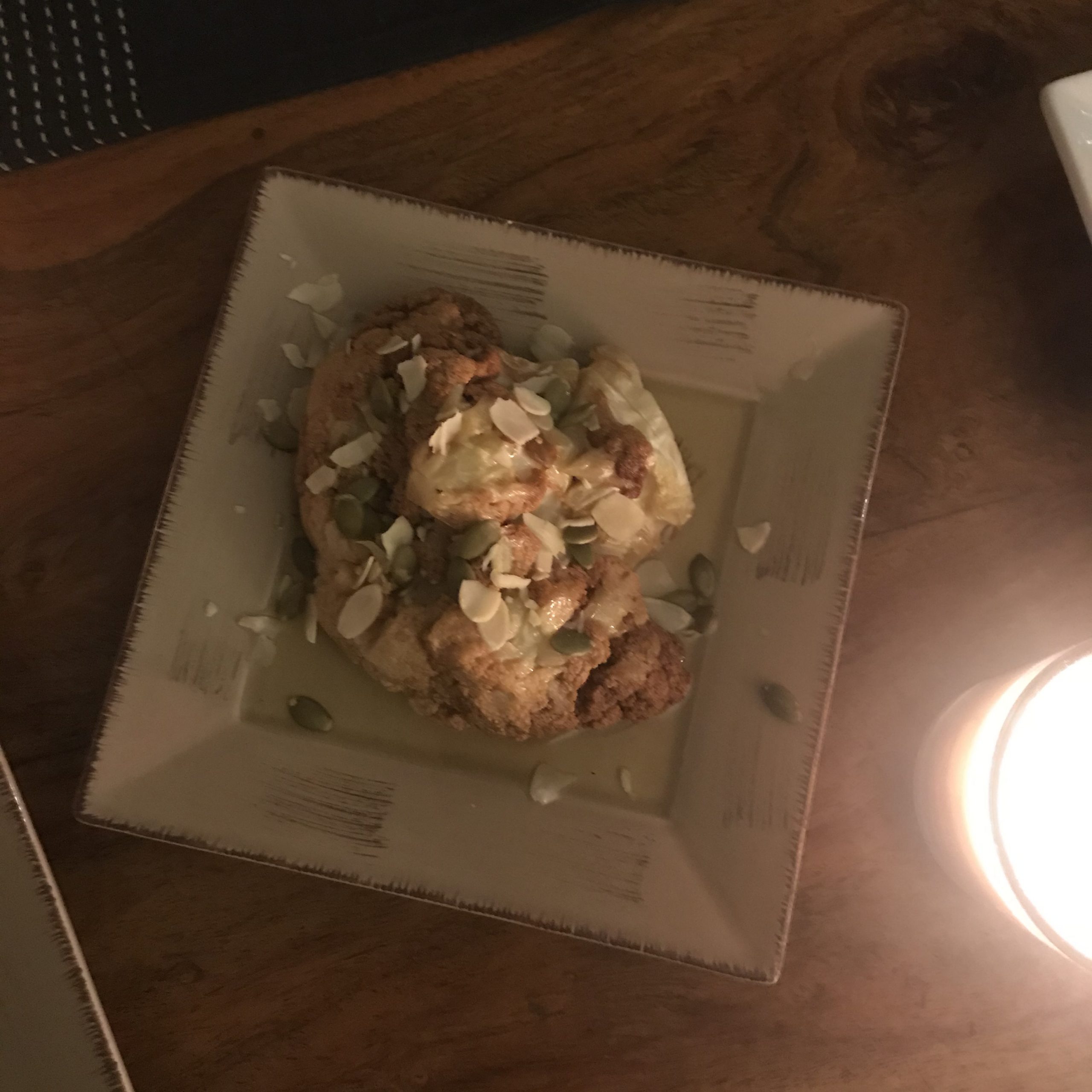 Roast cauliflower covered with almonds