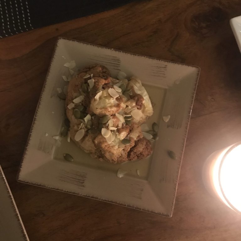 Roast cauliflower covered with almonds 