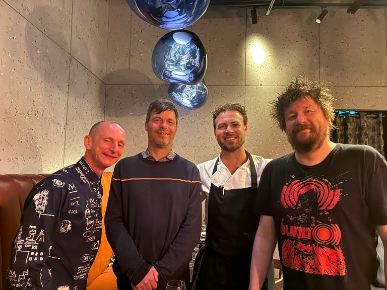 Four people posing at Fellow Restaurant London: me; my partner, Toby; our friend Chris; and Jack the owner/YouTuber.