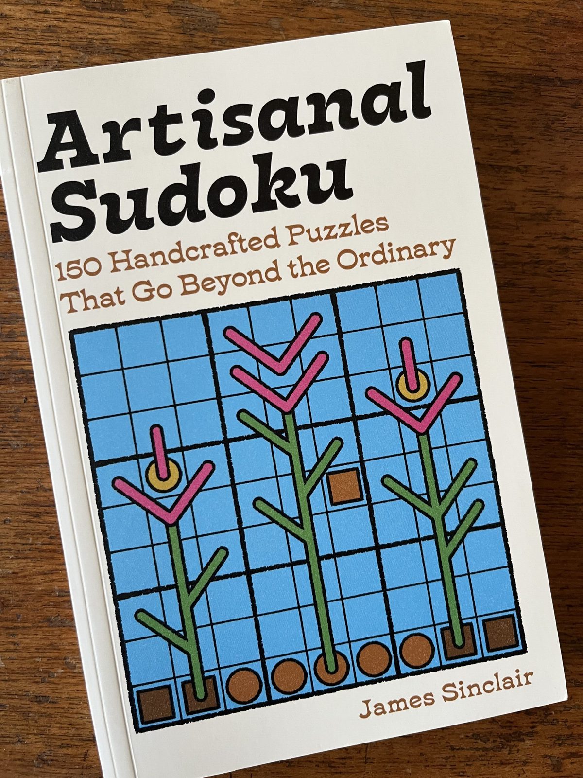 The front cover of Artisanal Sudoku by James Sinclair: 150 Handcrafted Puzzles That Go Beyond the Ordinary.